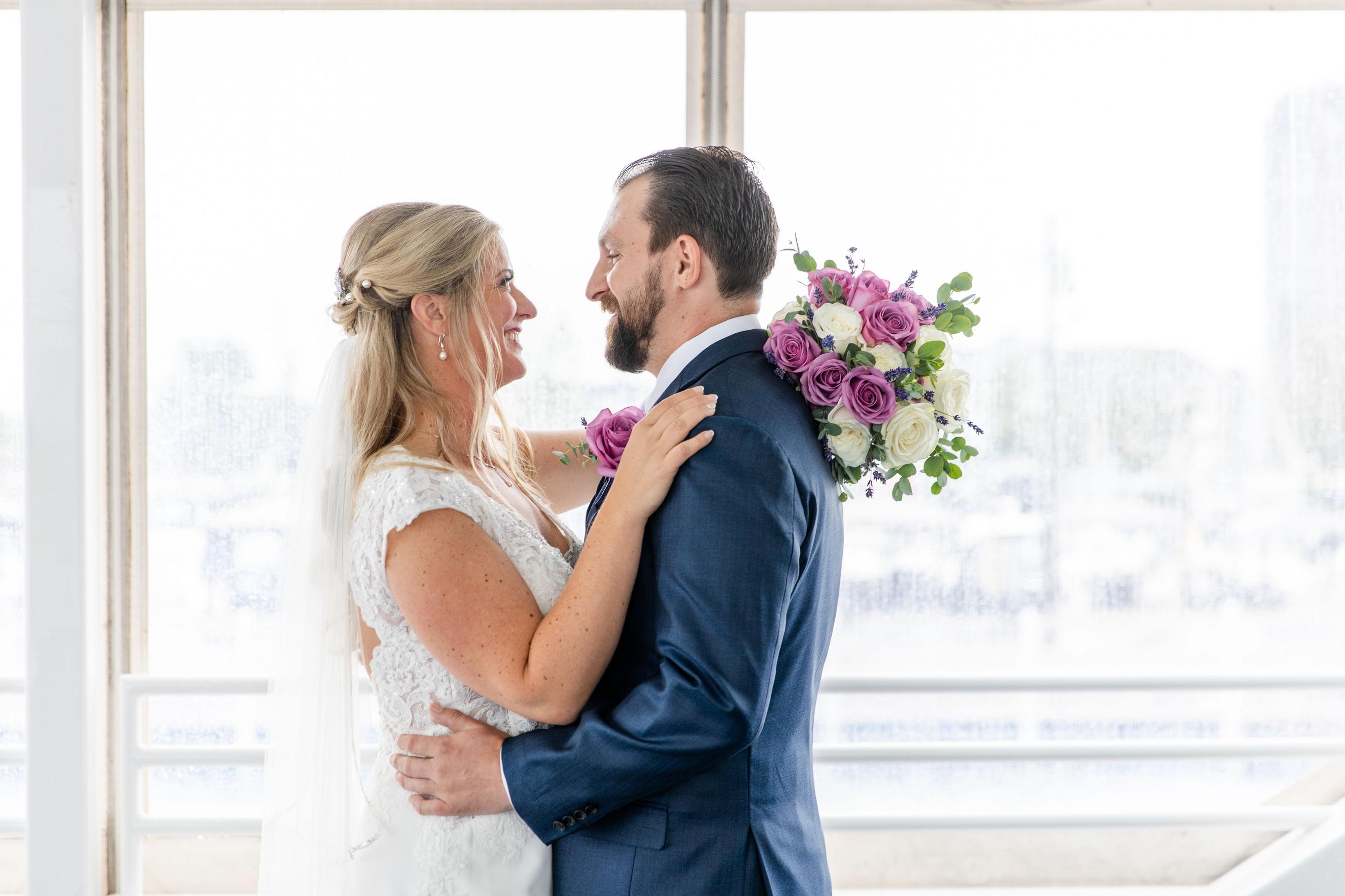 Embracing the Rain with Danielle and Matt: An Infinity & Ovation Yacht Wedding